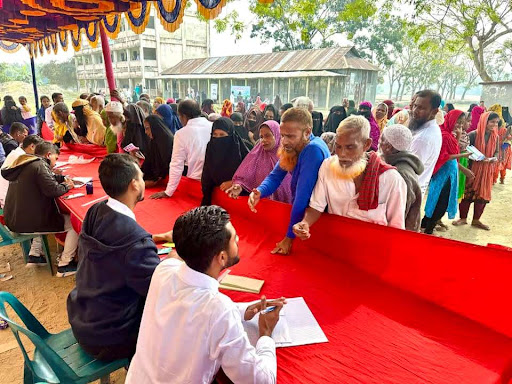 People checking in for the Medical camp in the registration booth